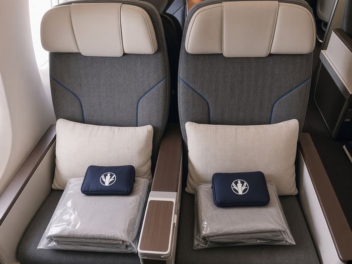 ANA Premium Economy seats with pillow, blanket and amenity kit