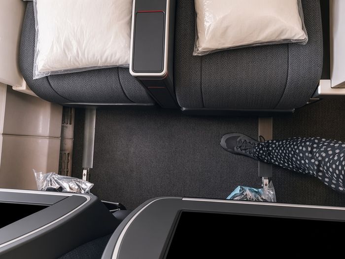 Lufthansa Premium Economy cabin, looking down at the seat pitch