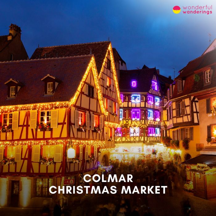 Colmar Christmas Market title card: illuminated half-timbered houses at dusk