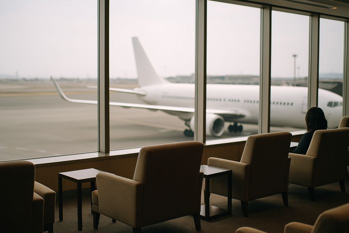 Japan Airlines lounge windows looking out onto the apron
